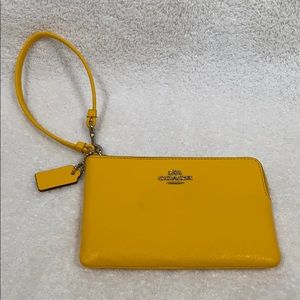 Coach yellow zippered wristlet